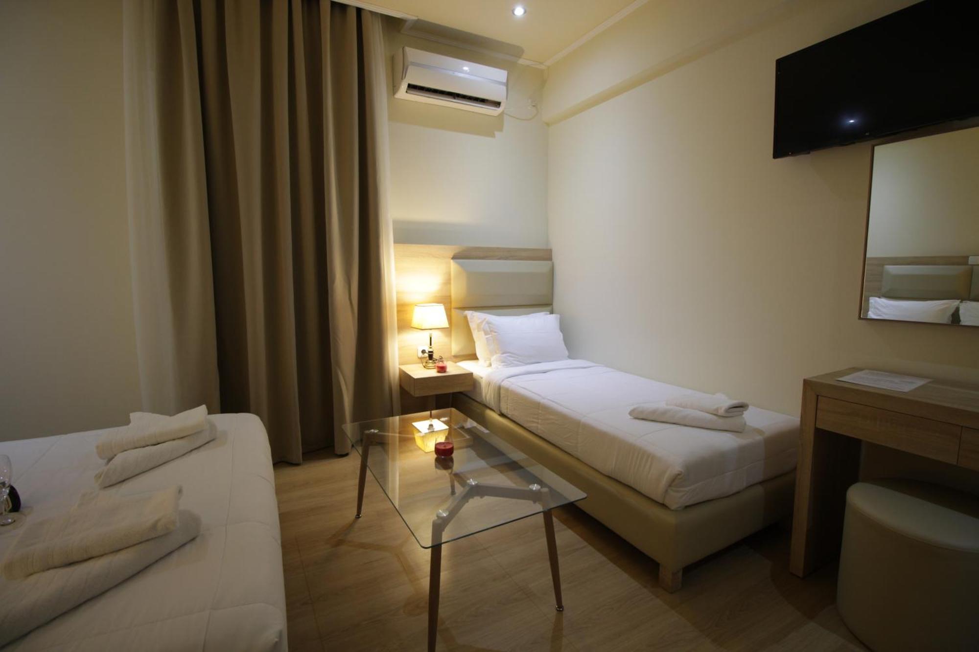 Elikon Hotel Atenas Quarto foto